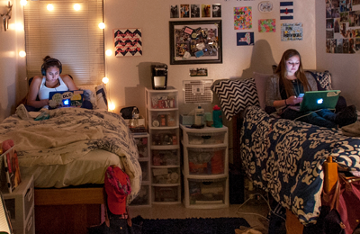 students in dorm room